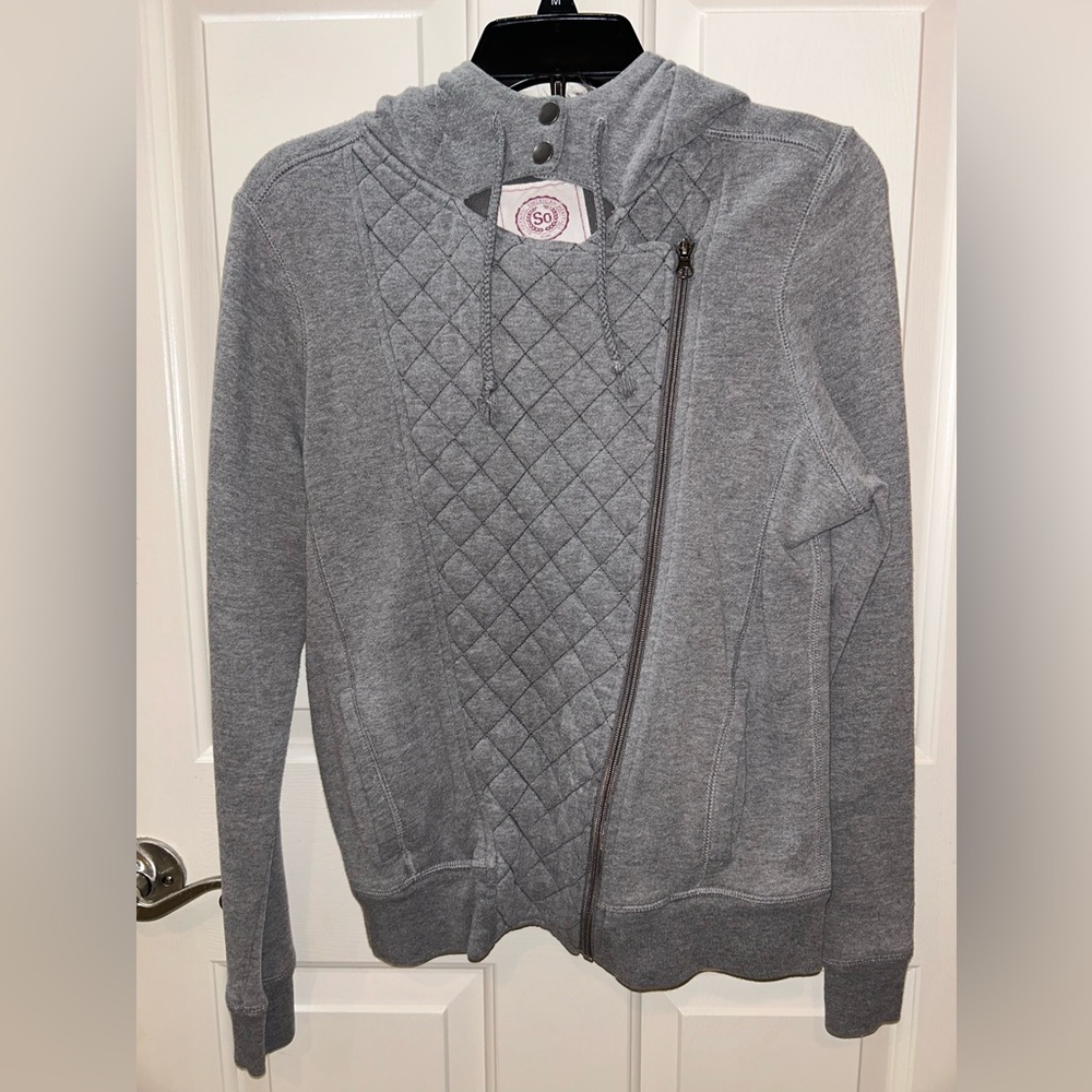 Gray sweater with animal fur on the hood